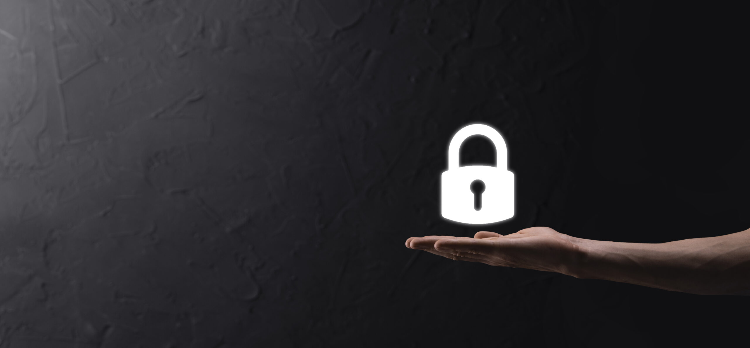 Male hand holding a lock padlock icon.Cyber security network. Internet technology networking.Protecting data personal information on tablet. Data protection privacy concept. GDPR. EU.Banner